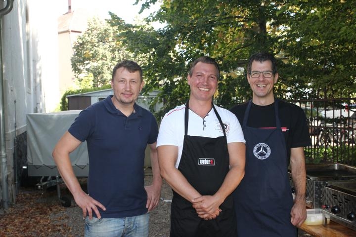 Drei Herren vom Grill